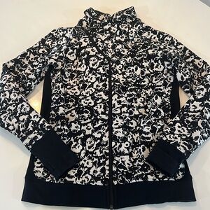 Lululemon black and white Scuba with a-symmetrical zipper.